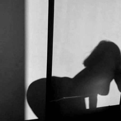 Noir Silhouette: Minimalist Wall Projection