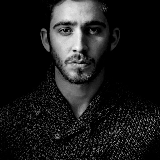 Noir Jawline: Chiaroscuro Shadow Portrait
